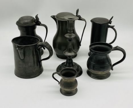 A collection of vintage pewter including an Art Nouveau hot water jug, single candlestick etc