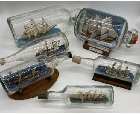A collection of vintage ships in bottles including Cutty Sark, Edith Morgan, HMS Pantaloon etc.