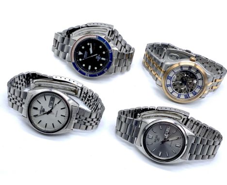 A Seiko SQ Sports 100 Quartz stainless steel gentleman's wristwatch along with two Seiko 5 automatic wristwatches and a Rotar