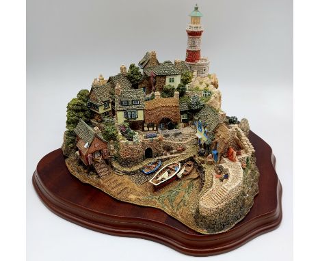 A large Lilliput Lane collectors' cottage model Out of The Storm depicting a harbour scene (Number 1188 in a limited edition 