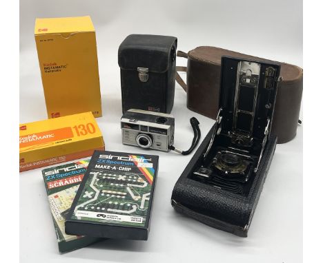 A collection of vintage cameras and equipment including Kodak Instamatic, Canadian Eastman Kodak etc. along with two ZX Spect