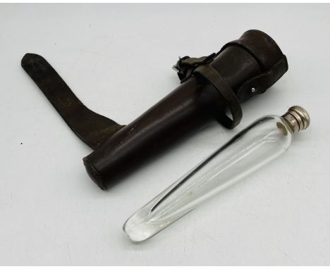A glass hunting flask in leather case