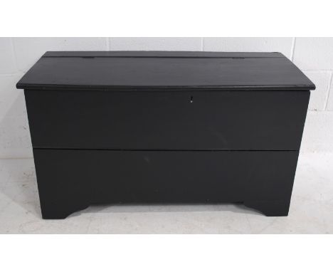 A black painted elm trunk - length 118.5cm, depth 46.5cm, height 61cm