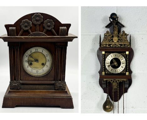 A Dutch Atlas wall clock with pear shaped weights (back A/F) along with an oak cased mantle clock with floral decoration