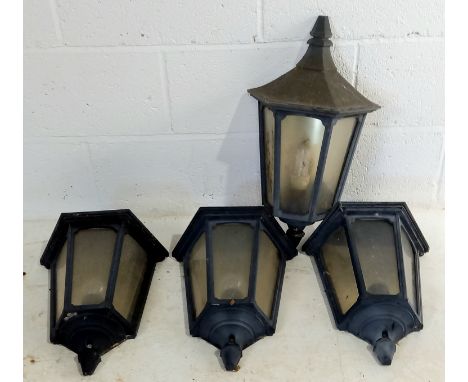 A set of four vintage garden lantern wall lights.