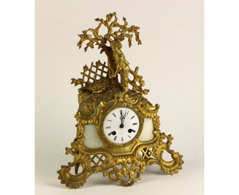 A 19th Century French ormolu Mantle Clock, by Henri Marc, Paris, the capital decorated with a young boy picking fruit on a ro