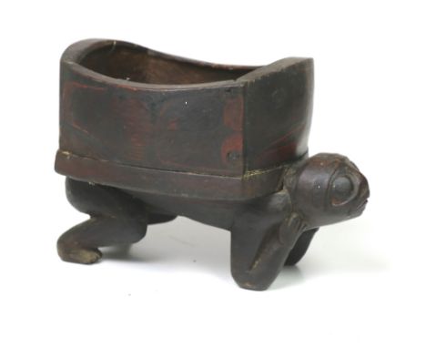 A rare and unsusual Ethnographic possibly Native American Item, modelled as a grotesque figure spread on torso, with hollowed