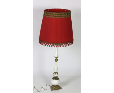 An attractive marble and ormolu mounted unusually shaped small Lamp Standard, with red decorative shade. (2)Provenance: Paul 