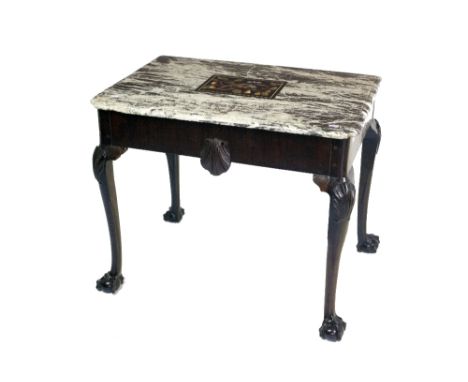 An unusual 19th Century mahogany and marble top Side Table, in the Irish Chippendale style, the moulded speckled marble top i