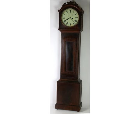 A Victorian mahogany dome shaped Grandfather Clock, with carved cartouche and minute finials with circular painted dial and R