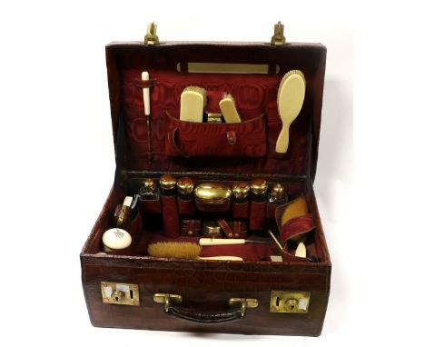 A fine quality and near complete Edwardian period 'Gentleman's' Case, fitted with silver gilt mounted glass bottles, marked P