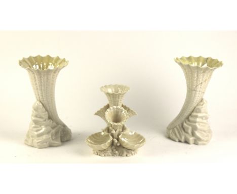 A First Period Belleek "Multiple" cornucopia and shell Centre Vase, together with two Second Period cornucopia Vases, (one re