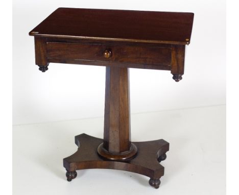 A William IV mahogany Side Table, the plain top over frieze drawer with finial drops on a octagonal pillar support with quatr