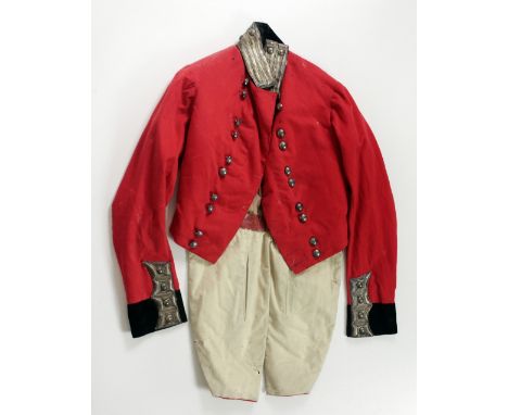 A rare late 18th Century / early 19th Century "Kildare Militia" red Coat with velvet collar and cuffs and with silver bullion