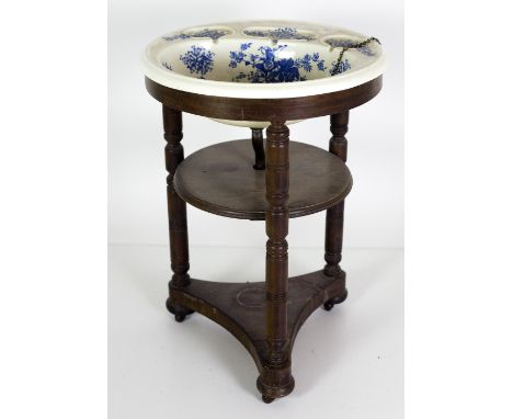 A Victorian "Ships Wash Stand," the two tiered body with a blue and white porcelain basin inset. (1)
