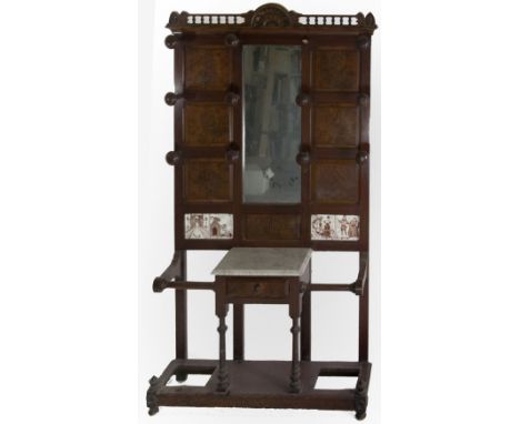 A good quality Edwardian Stick and Umbrella Stand, with carved and pierced gallery top over six panels with figures worn, wit