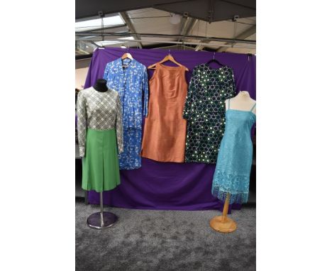 A mixed lot of vintage dresses including two brightly patterned 1960s dresses, medium to larger sizes.