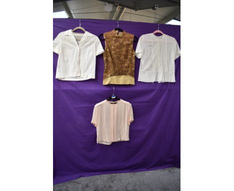A selection of vintage 1950s blouses.