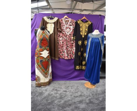 A mixed lot of vintage ladies clothing, some interesting prints including tribal and tie dye effects.