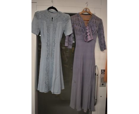 Two vintage dresses,including 1940s pale blue dress,both extra small sizes with some staining and a little wear and tear in p