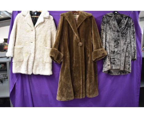 Three vintage faux fur coats.