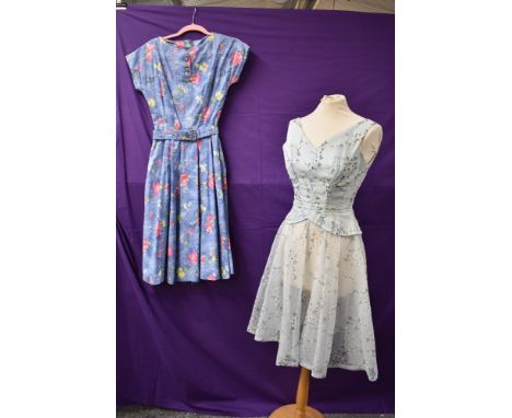 One vintage 1950s St Michaels dress in floral cotton with belt and an American 1950s sheer skirted Joan Barrie New york dress