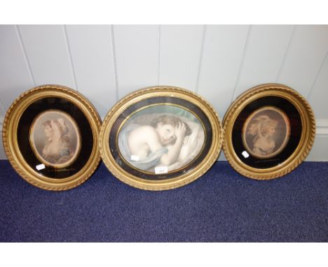 A PAIR OF ENGRAVINGS 'A St Giles Beauty', 'A St James's Beauty' and another similar print, all in oval gilt frames
