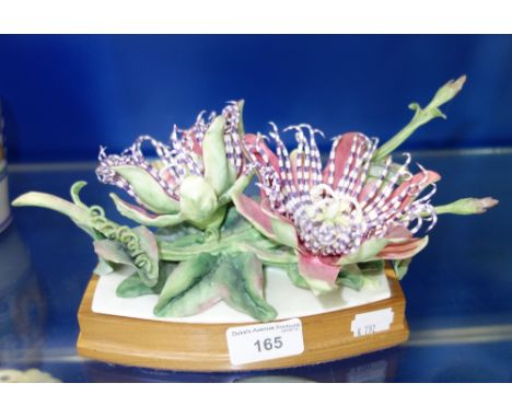 A ROYAL WORCESTER STUDY, "PASSION FLOWERS" 1960, on a wooden base