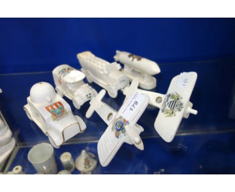 FIRST WORLD WAR INTEREST: A COLLECTION OF CRESTED CHINA, to include an Armoured car, an ambulance, a bi-plane and a charabanc