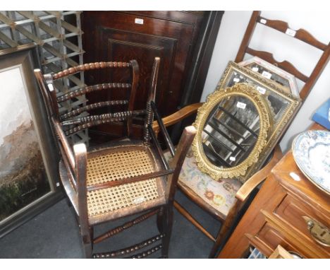 A PAIR OF REGENCY BOBBIN-TURNED CHAIRS with cane seats, a ladderback armchair and a quantity of mirrors