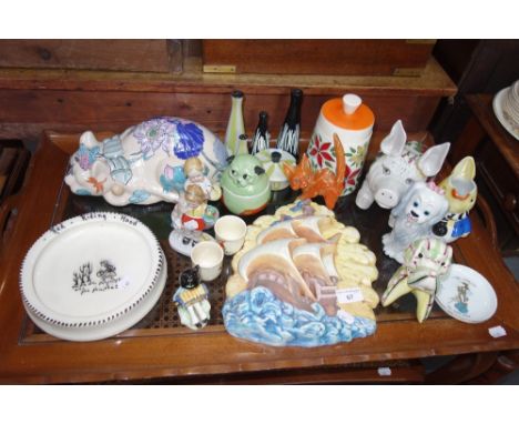 A GOEBEL CAT, playing a squeeze box a ceramic plaque of a ship in full sail and similar decorative Vintage ceramics