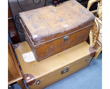A VINTAGE TRUNK with leather corners and a Vintage tin trunk