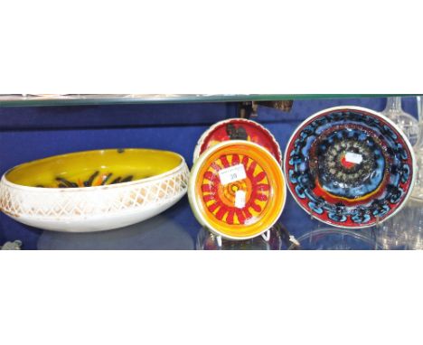 A COLLECTION OF POOLE POTTERY "DELPHIS" including a large bowl, 28 cm dia. and three smaller (4)