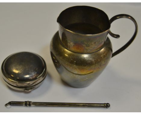 Silver - a silver cream jug, Birmingham 1900, 63.4g; a silver coin purse, 26g gross; as silver coloured swizzle stick (3)