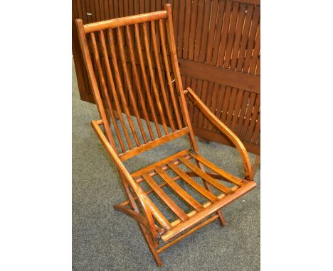 A late Victorian 'Jieldes patent' folding stick back steamer chair, iron fittings