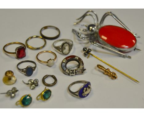 Jewellery - a Scottish silver and agate brooch in the form of a buckle; a silver coloured and red stone brooch in the form of