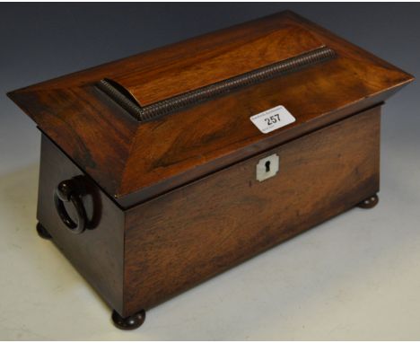 A Victorian mahogany sarcophagus shaped tea caddy c.1860