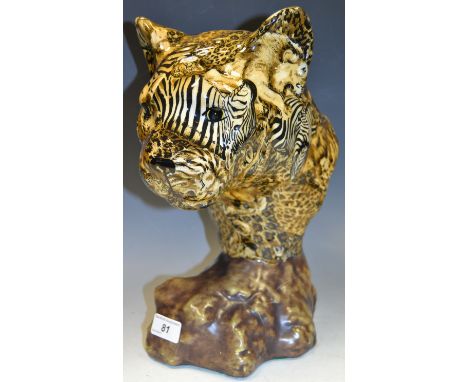 A contemporary ceramic model of a Panthers head printed with Lions  and Zebras