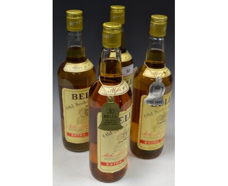 Whisky - three bottles of Bells Old Scotch Whisky, extra special, 26fl oz, 70% proof; one bottle of Bells Old Scotch Whisky e