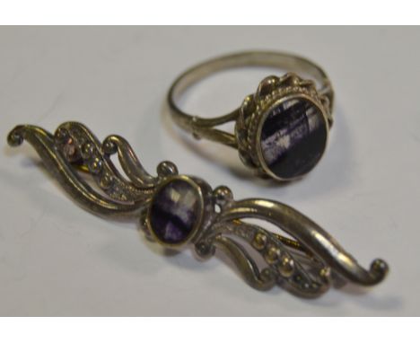 A silver mounted Blue John ring; a similar brooch