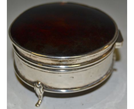 A silver and tortoiseshell circular trinket box and cover, by Asprey, London