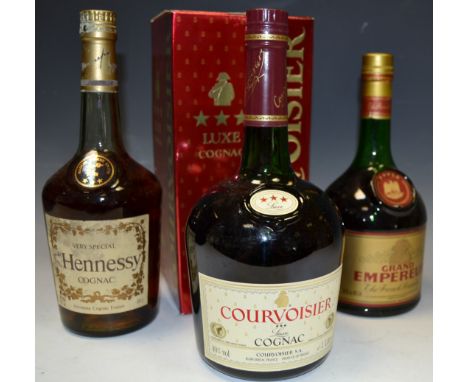 Cognac - a bottle of Hennessy very special cognac, 68 cl, 70% proof; a bottle of Courvoisier Luxe cognac, three star, 1 litre