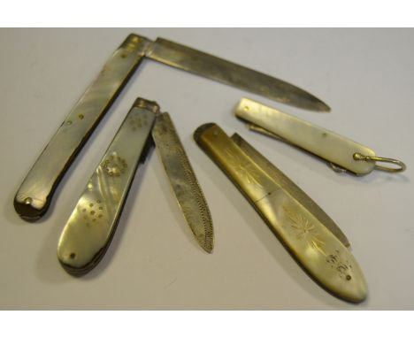 A Victorian silver and mother of pearl folding pocket button hook, Sheffield 1897; three pocket fruit knives, similar (faults