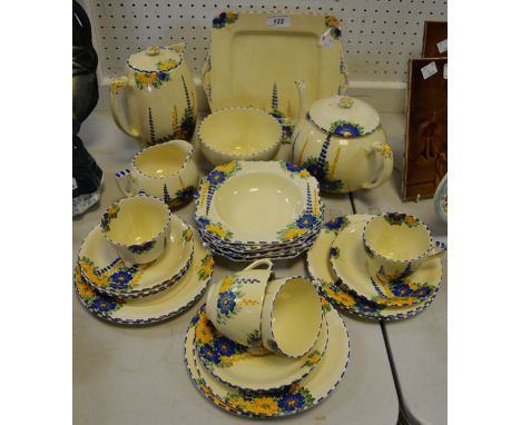 A Crown Devon part tea service comprising of, coffee pot, bread and butter plate; cups, saucers; etc