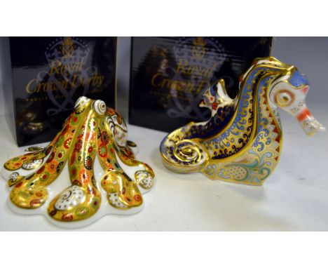 A Royal Crown Derby paperweight, Coral Seahorse, boxed, gold stopper; Limited Edition Octopus, boxed, gold stopper (2)