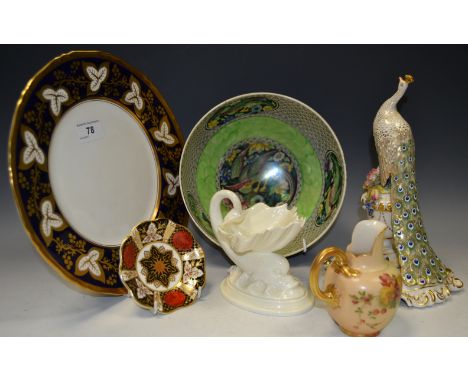 Decorative Ceramics - a Royal Worcester miniature blush ivory flat back jug(faults); a Royal Crown Derby model of a Peacock, 