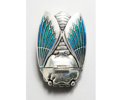 A SILVER PLATE AND ENAMEL SCARAB VESTA.