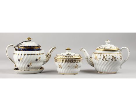 TWO 18TH CENTURY WORCESTER TEAPOTS AND COVERS, one decorated in gold, the other decorated in blue and gold; together with a g