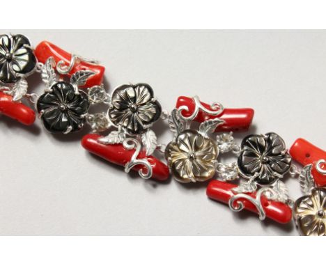 A SILVER, CORAL AND MOTHER-OF-PEARL BRACELET. 7.5ins long.