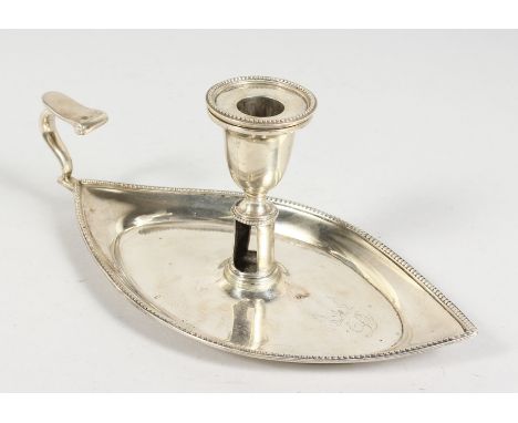 A BOAT SHAPED CHAMBER CANDLESTICK. Bears crest of The Barings Family.